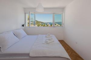 Ένα ή περισσότερα κρεβάτια σε δωμάτιο στο Skyline Suite