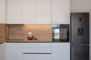 Η κουζίνα ή μικρή κουζίνα στο Skyline Suite