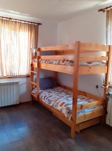 a bedroom with two bunk beds in a room at Sokol i Kalina spa in Pchelin +15 photos