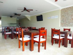 TV a/nebo společenská místnost v ubytování Hotel Marvento Suites