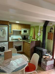 Kuchyň nebo kuchyňský kout v ubytování Apartaments La Clotxa - Prat de Comte