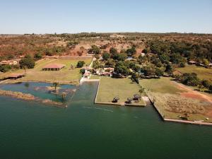 an aerial view of an island in a body of water at Pontal da lagoa in Planaltina