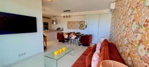 Μια τηλεόραση ή/και κέντρο ψυχαγωγίας στο Aria Serena - Séjour vue mer en centre-ville