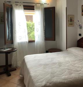 Gambar di galeri bagi Guspini-Casa vacanze con giardino IUN R1321 di Guspini +3 gambar