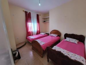 Postel nebo postele na pokoji v ubytování Maison pour vacance a Hammam Al Ghezaz