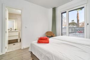 Ένα ή περισσότερα κρεβάτια σε δωμάτιο στο Apartamento Playa Cabria +24 φωτογραφίες
