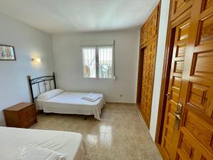 Postel nebo postele na pokoji v ubytování Apartamento Panorama X0089 - Salco la Cumbre