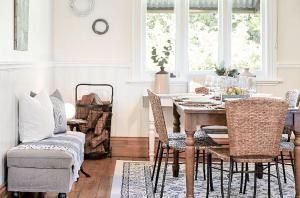 a dining room with a table and chairs at MARIGOLD COTTAGE Charming 1870s central Daylesford cottage in Daylesford