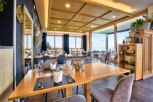 Posezení v ubytování Hotel Restaurant Berghaus Malbun Buchserberg + 22 fotografií