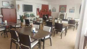 TV a/nebo společenská místnost v ubytování Canna Garden Hotel - Adult Only