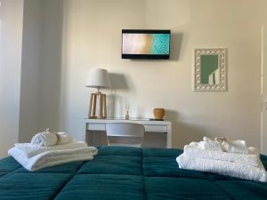 Postel nebo postele na pokoji v ubytování B&B Campus Suites Bari + 57 fotografií
