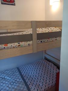 Postel nebo postele na pokoji v ubytování Appartement lumineux, proche mer et lac + 27 fotografií