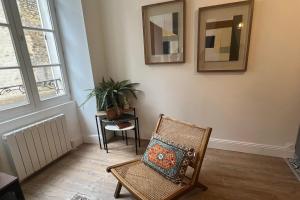 Posezení v ubytování Appartement La Caresse de l’Amarante