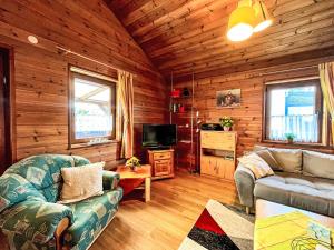 Μια τηλεόραση ή/και κέντρο ψυχαγωγίας στο Holiday Home Löwenzahn by Interhome +17 φωτογραφίες
