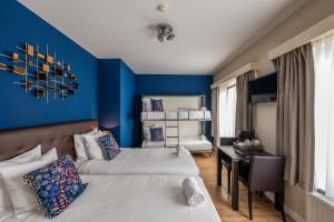 Postel nebo postele na pokoji v ubytování Hotel Onderbergen