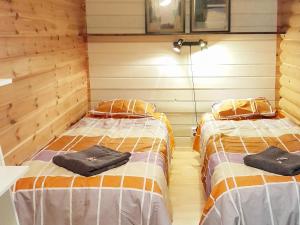 Postel nebo postele na pokoji v ubytování Holiday Home Tuunaantupa 2 f by Interhome