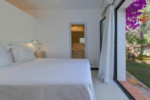Posteľ alebo postele v izbe v ubytovaní Bonita stay B Light Piscina climatizada, bbq, wifi
