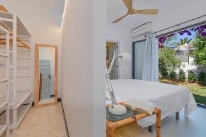 Posteľ alebo postele v izbe v ubytovaní Bonita stay B Light Piscina climatizada, bbq, wifi