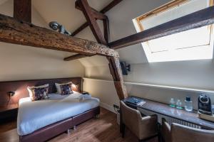 Postel nebo postele na pokoji v ubytování Hotel Onderbergen