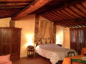 A bed or beds in a room at I Chiari Még 24 kép