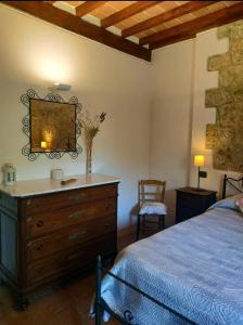 A bed or beds in a room at Agriturismo La Provenca