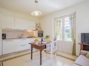 Kuchyň nebo kuchyňský kout v ubytování Apartment Appartamento Rosa by Interhome + 30 fotografií