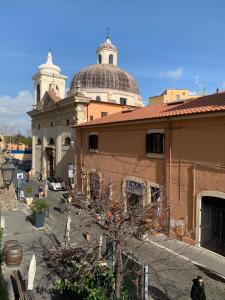 a building with a dome on top of it at Old Town Nest in Civitavecchia in Civitavecchia