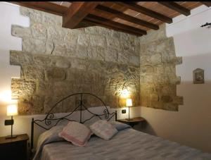 A bed or beds in a room at Agriturismo La Provenca