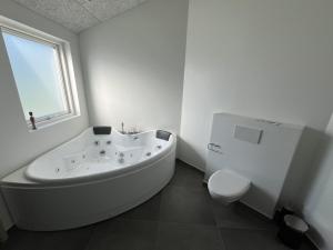 Koupelna v ubytování Holiday Home Henryk - 75m from the sea by Interhome
