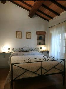 A bed or beds in a room at Agriturismo La Provenca