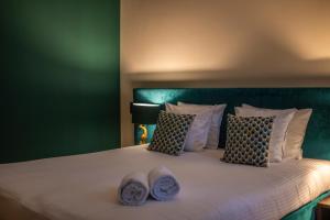 Postel nebo postele na pokoji v ubytování Hotel Onderbergen