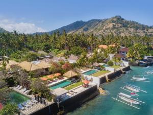an aerial view of a resort on the water at Villa Kaniksa in Candidasa