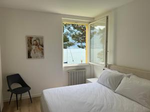 Postel nebo postele na pokoji v ubytování VILLA SAN VITO - Lake Como + 6 fotografií