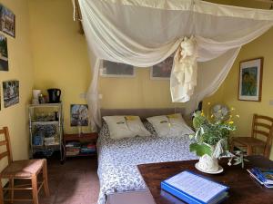 Ένα ή περισσότερα κρεβάτια σε δωμάτιο στο Casa Octavia