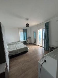 Letto o letti in una camera di My House Kvariati