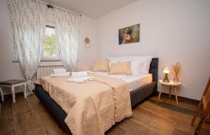 Ένα ή περισσότερα κρεβάτια σε δωμάτιο στο Villa Ondine with 3 bedrooms in Istrien +36 φωτογραφίες