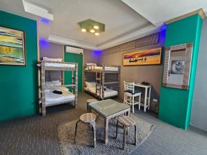 Postelja oz. postelje v sobi nastanitve Attic Capsule Hotel