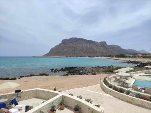 a view of the beach and the ocean at Blue Beach Villas Apartments in Stavros