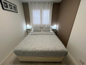 Postel nebo postele na pokoji v ubytování Apartamento con vista lateral, playa Cambrils-Vilafortuny