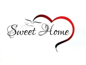 een rood hart met de woorden zoet thuis bij SWEETHOME am WOOGBACH Speyer in Speyer