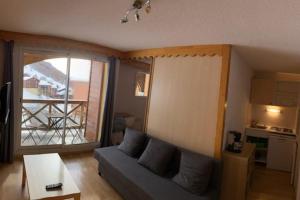 Posezení v ubytování Appt dans chalet résidence Les Balcons du Soleil