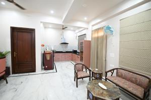 Kuchyň nebo kuchyňský kout v ubytování Hadendra Residences