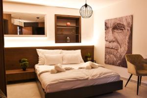 Postel nebo postele na pokoji v ubytování JR Piran B&B