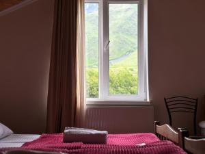 Rúm í herbergi á Hotel Dari