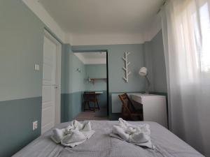 Posteľ alebo postele v izbe v ubytovaní Levélke Mini Apartman