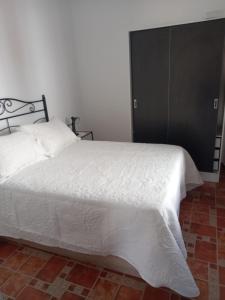 Postel nebo postele na pokoji v ubytování Casa Emilia