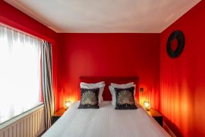 Postel nebo postele na pokoji v ubytování Hotel Onderbergen
