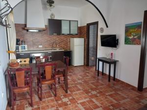 Kuchyň nebo kuchyňský kout v ubytování Casa Emilia