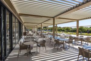 Residence Del Mar Emotion餐厅或其他用餐的地方