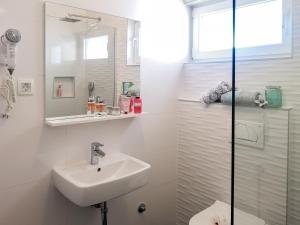 Koupelna v ubytování Principessa Rooms